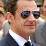 Sarkozy schiet op vakbonden en buitenlanders
